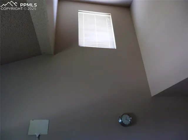 a view of balcony with wooden floor