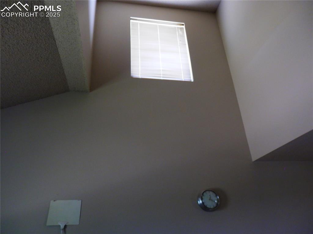 4450 Chaparral Road Colorado Springs, CO 80917 - Photo 11 of 29 a view of an empty room with a window