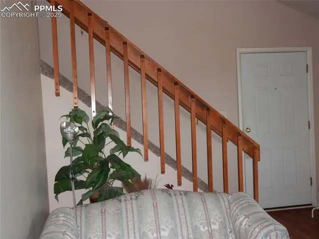 a room with furniture and a lamp