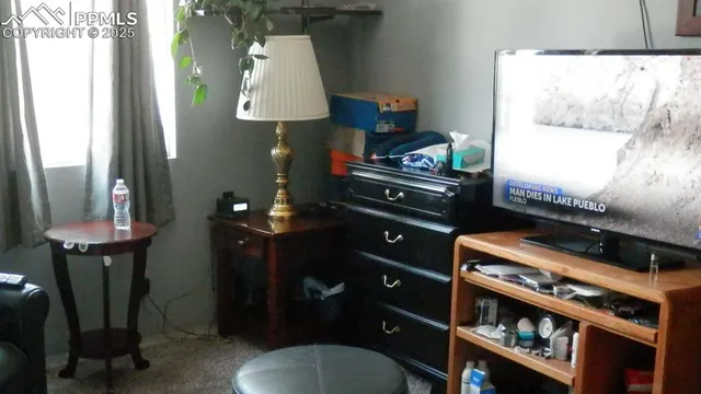 a room with a sink and a mirror