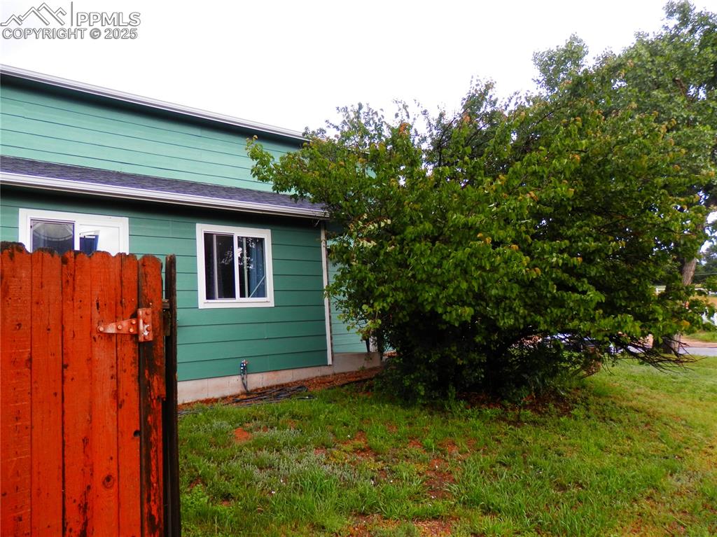 4450 Chaparral Road Colorado Springs, CO 80917 - Photo 2 of 29 a front view of a house with garden