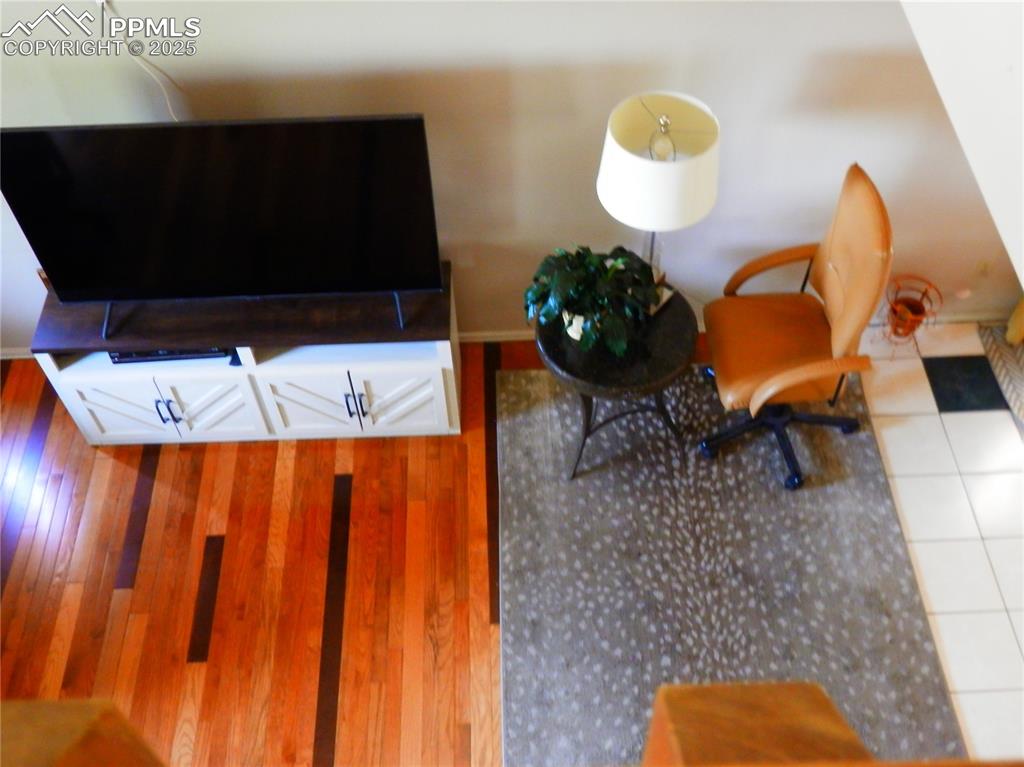 4450 Chaparral Road Colorado Springs, CO 80917 - Photo 22 of 29 a bathroom with a sink and mirror
