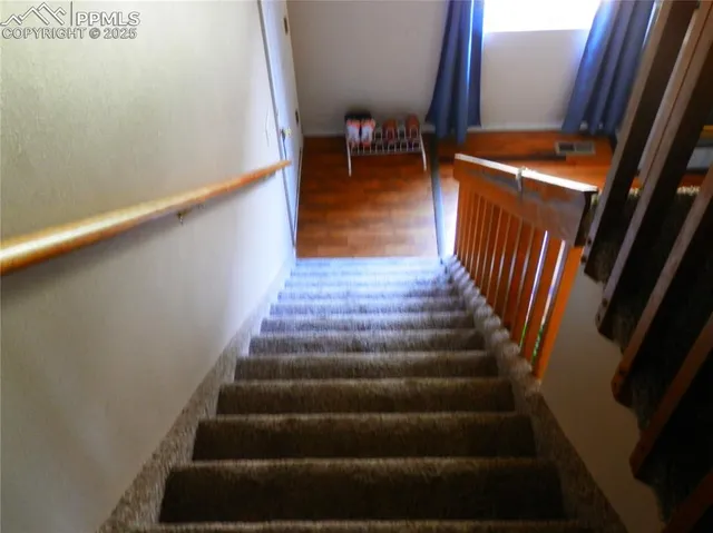 a room with furniture and a flat screen tv