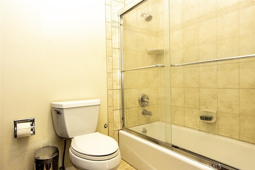 1830 Hawkbrook Drive San Dimas, CA 91773 - Photo 14 of 21 a bathroom with a toilet and a shower