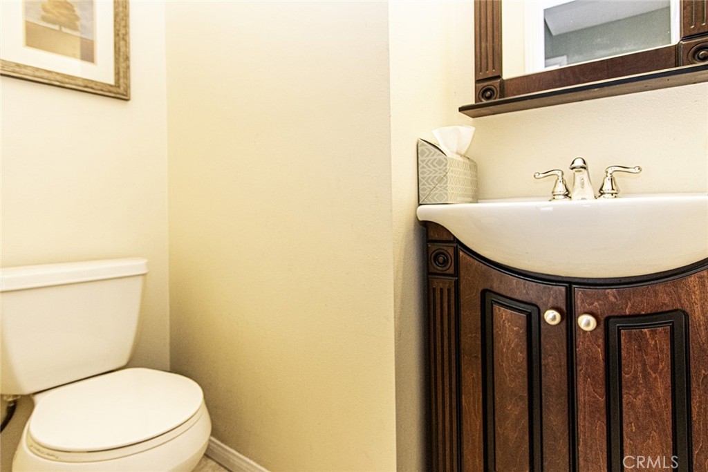 1830 Hawkbrook Drive San Dimas, CA 91773 - Photo 15 of 21 a bathroom with a toilet and a sink