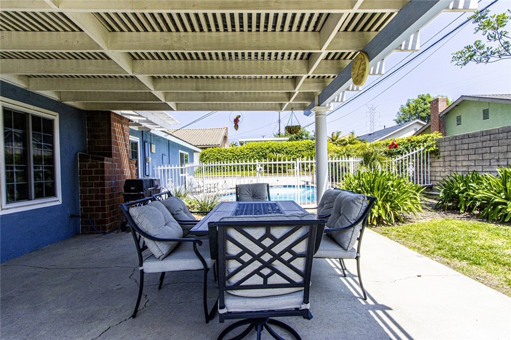 1830 Hawkbrook Drive San Dimas, CA 91773 - Photo 21 of 21 a view of patio with a table and chairs and potted plants