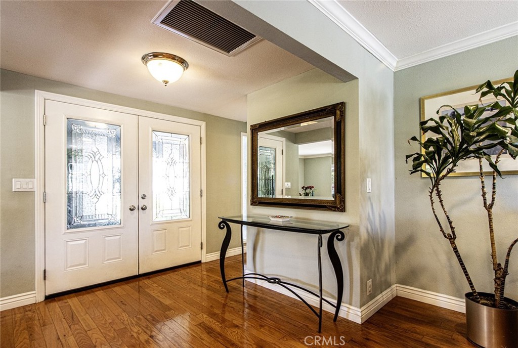 1830 Hawkbrook Drive San Dimas, CA 91773 - Photo 7 of 21 a view of a room with wooden floor and windows