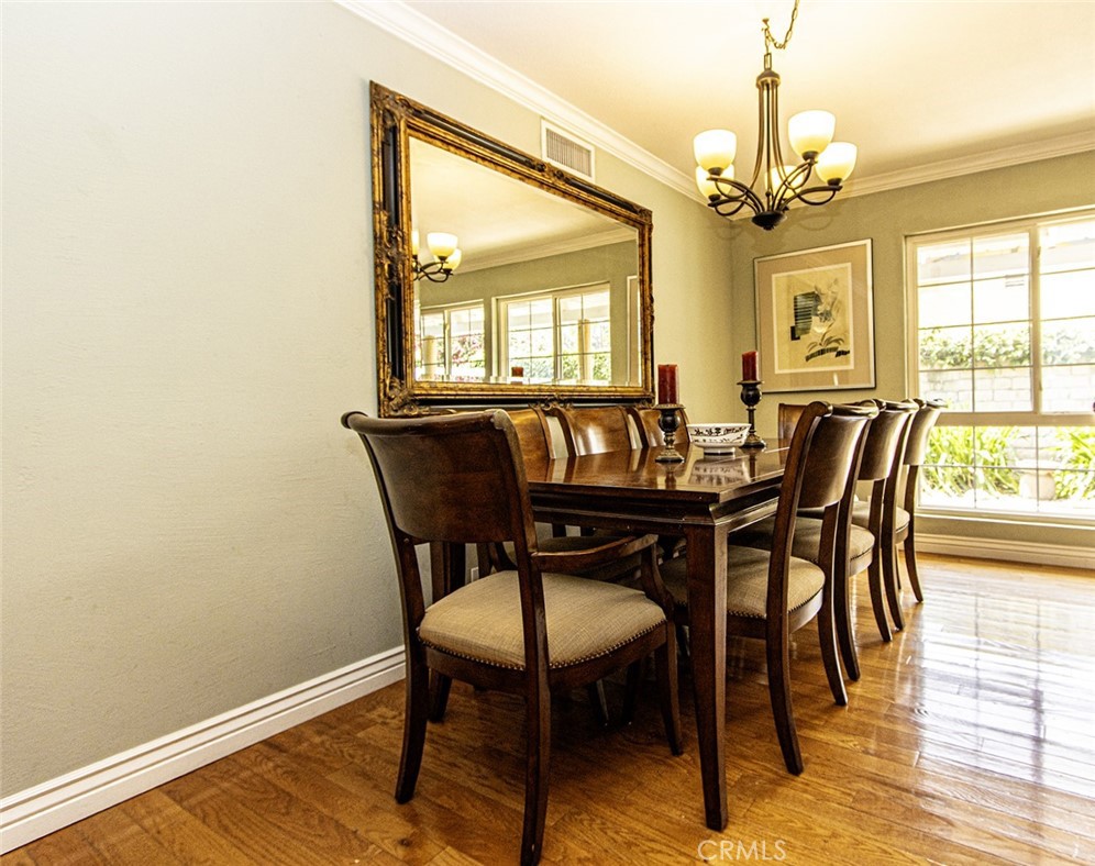 1830 Hawkbrook Drive San Dimas, CA 91773 - Photo 8 of 21 a view of a dining room with furniture window and wooden floor
