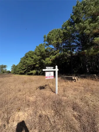 a sign board with lake view