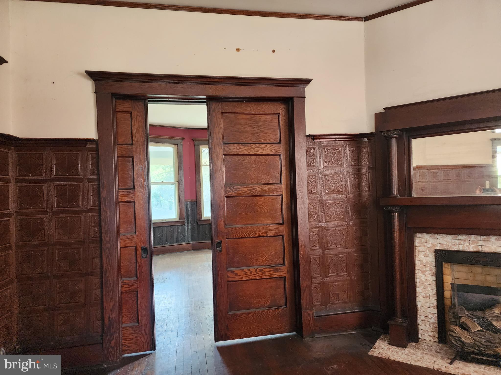 12608 Old Row Road Mount Savage, MD 21545 - Photo 4 of 35 Pocket doors leading into living room