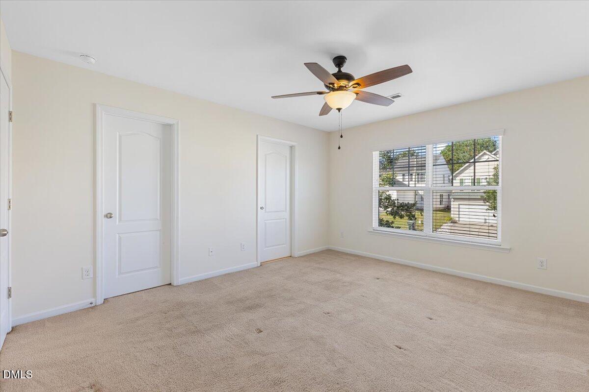 4440 Cardinal Grove Boulevard Raleigh, NC 27616 - Photo 19 of 42 a view of an empty room with a window