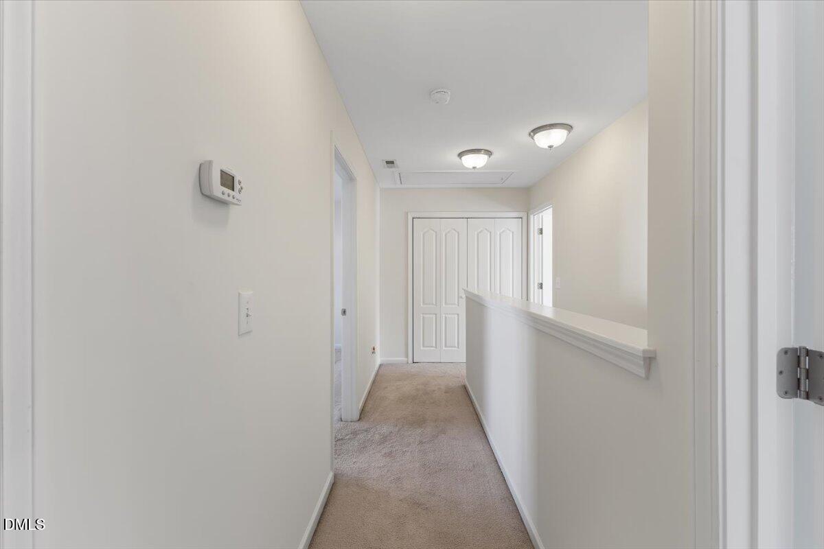 4440 Cardinal Grove Boulevard Raleigh, NC 27616 - Photo 30 of 42 a view of hallway with closet
