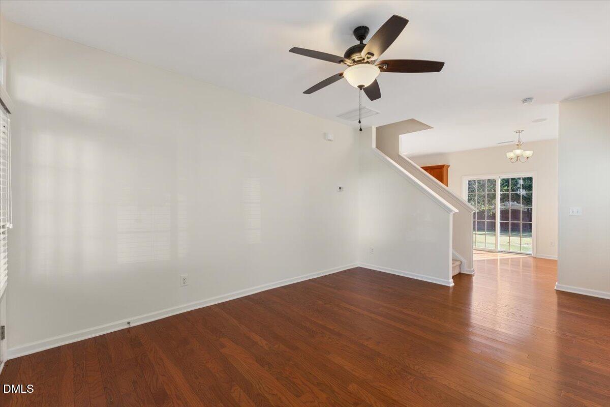 4440 Cardinal Grove Boulevard Raleigh, NC 27616 - Photo 4 of 42 wooden floor in an empty room