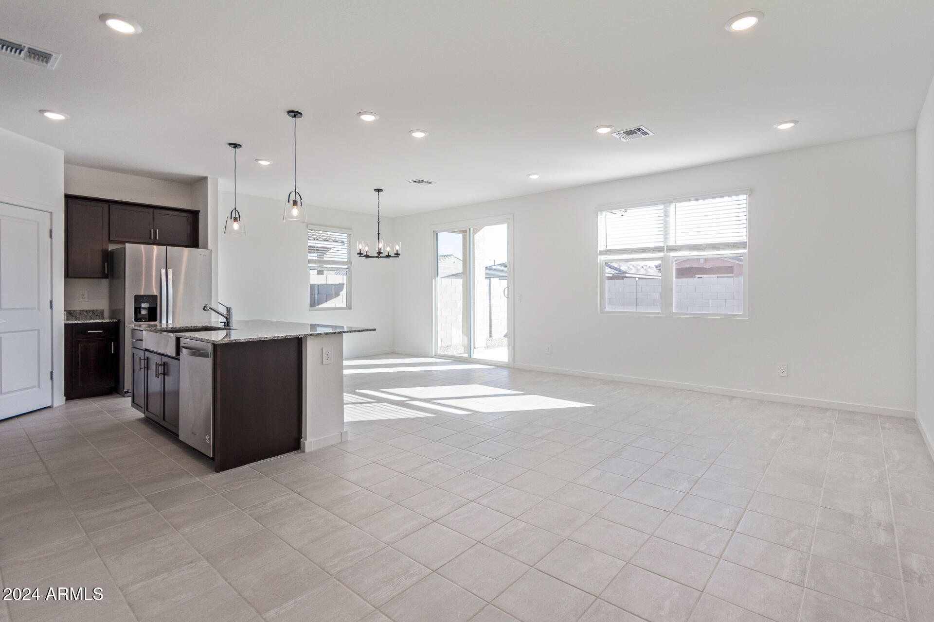 17629 West Madison Street Goodyear, AZ 85338 - Photo 5 of 46 Great Room / Kitchen