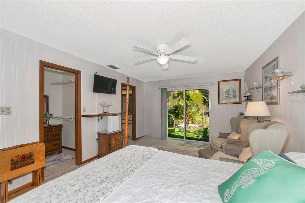 2070 59th Street Sarasota, FL 34243 - Photo 27 of 56 a bedroom with furniture and a window