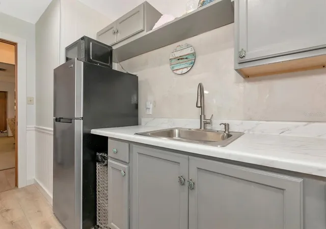 a swimming pool with outdoor seating and yard