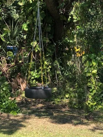 a view of swimming pool with an outdoor space and seating area