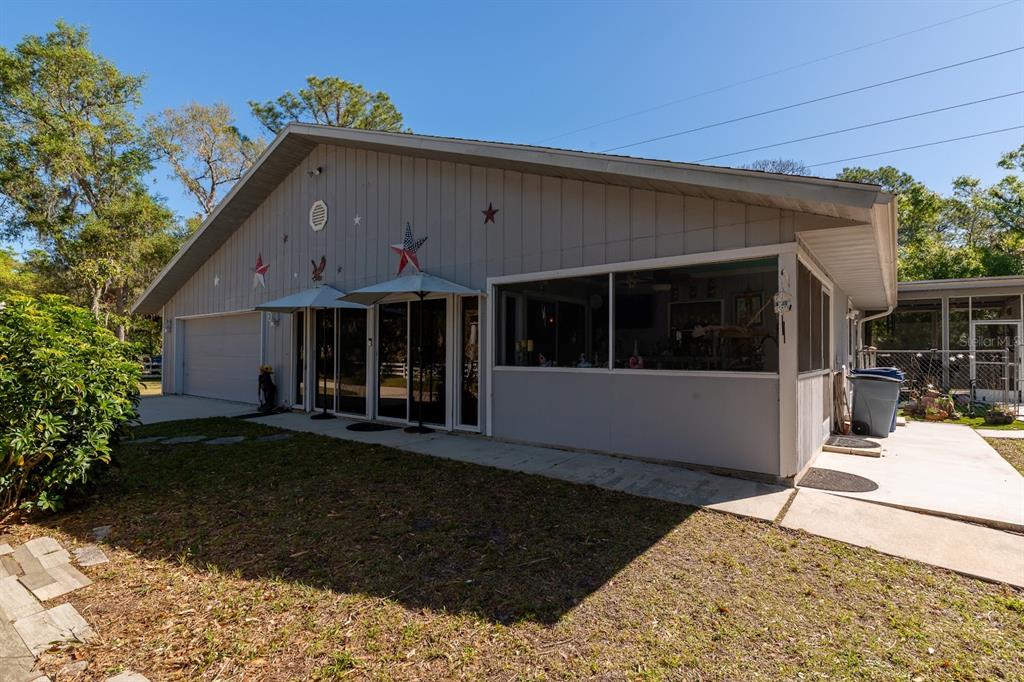 2070 59th Street Sarasota, FL 34243 - Photo 47 of 56 a front view of a house with a yard