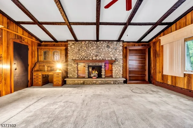 a bathroom with a sink a vanity and a large mirror