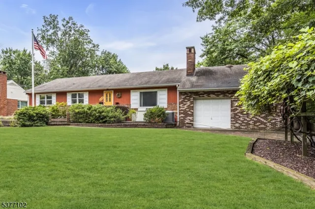 a view of a house with a park
