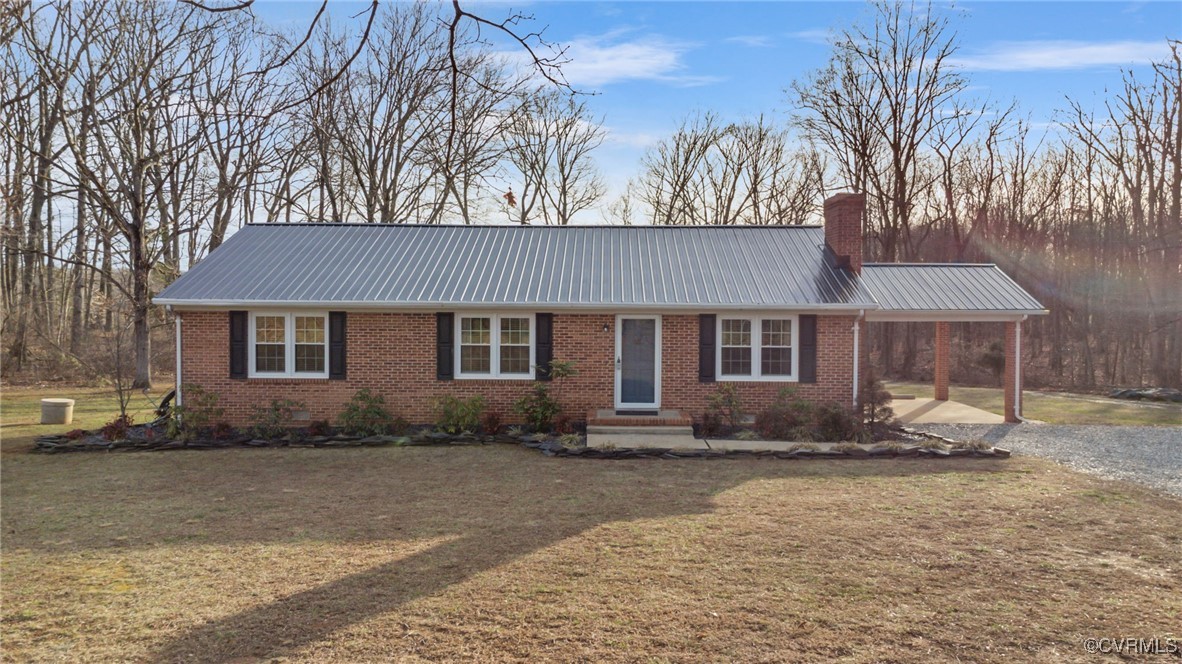 8087 Bell Road Dillwyn, VA 23936 - Photo 2 of 37 a front view of a house with a yard
