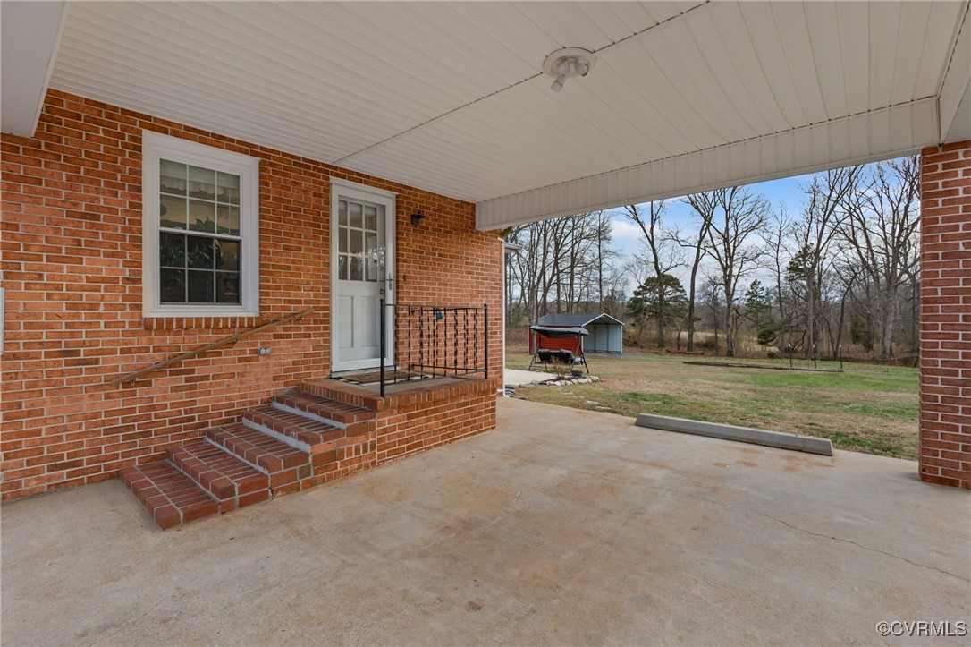 8087 Bell Road Dillwyn, VA 23936 - Photo 32 of 37 a view of backyard with large tree
