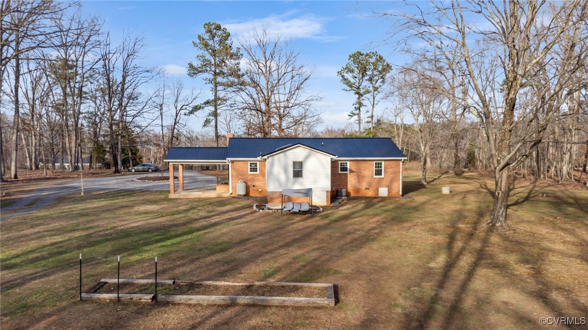 8087 Bell Road Dillwyn, VA 23936 - Photo 34 of 37 a front view of a house with a yard