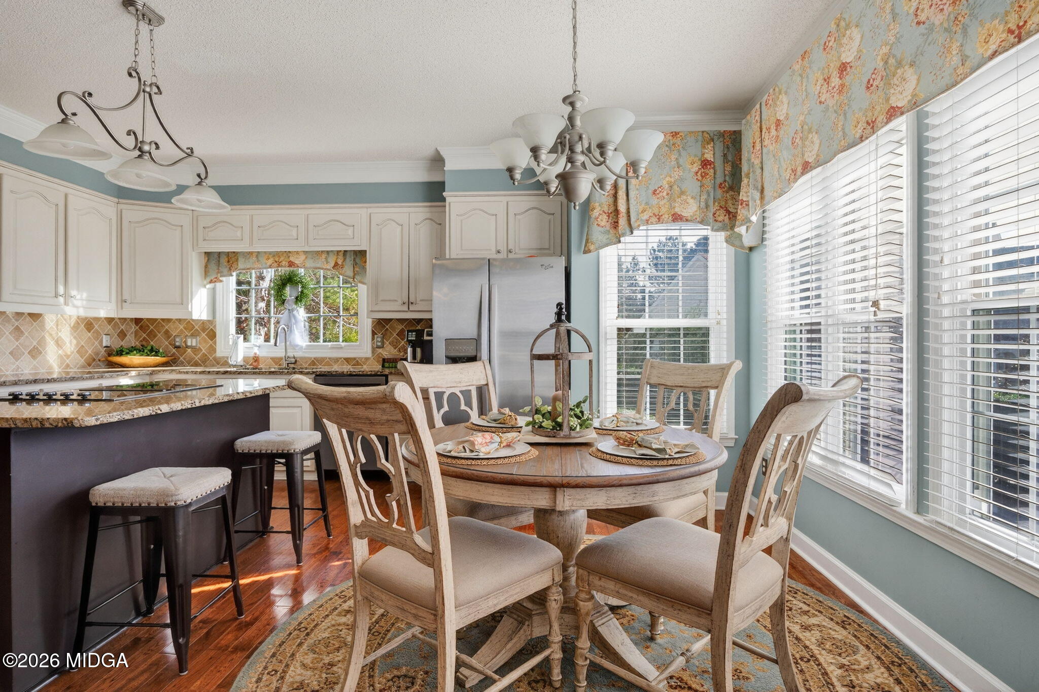 312 Pinnacle Park Macon, GA 31220 - Photo 13 of 63 a dining room with furniture a chandelier and kitchen view