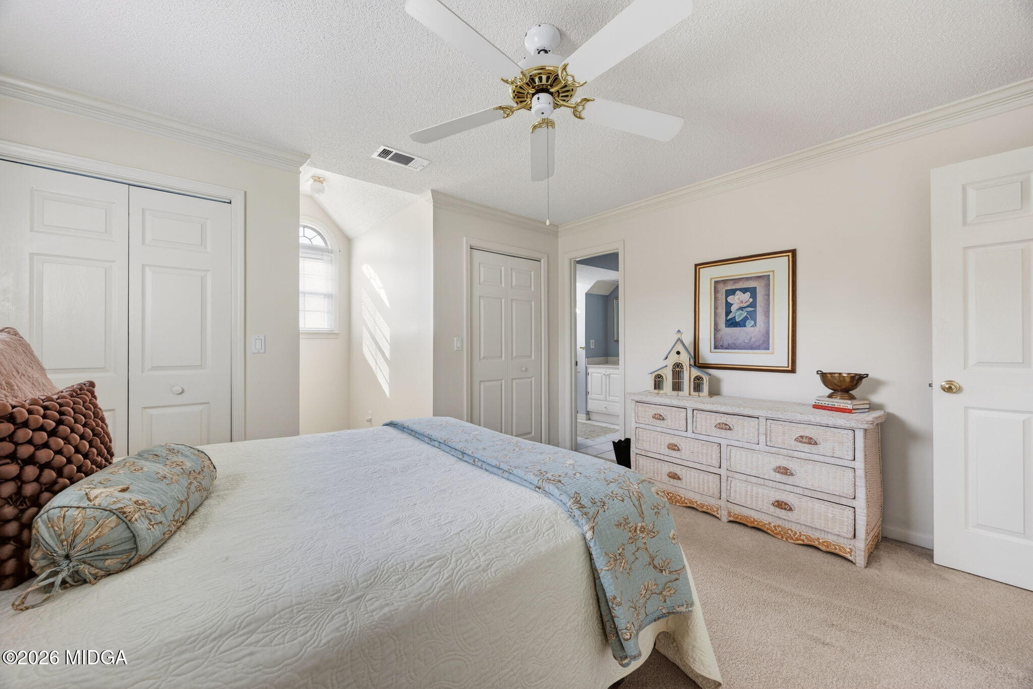 312 Pinnacle Park Macon, GA 31220 - Photo 31 of 63 a bedroom with a bed and a chandelier