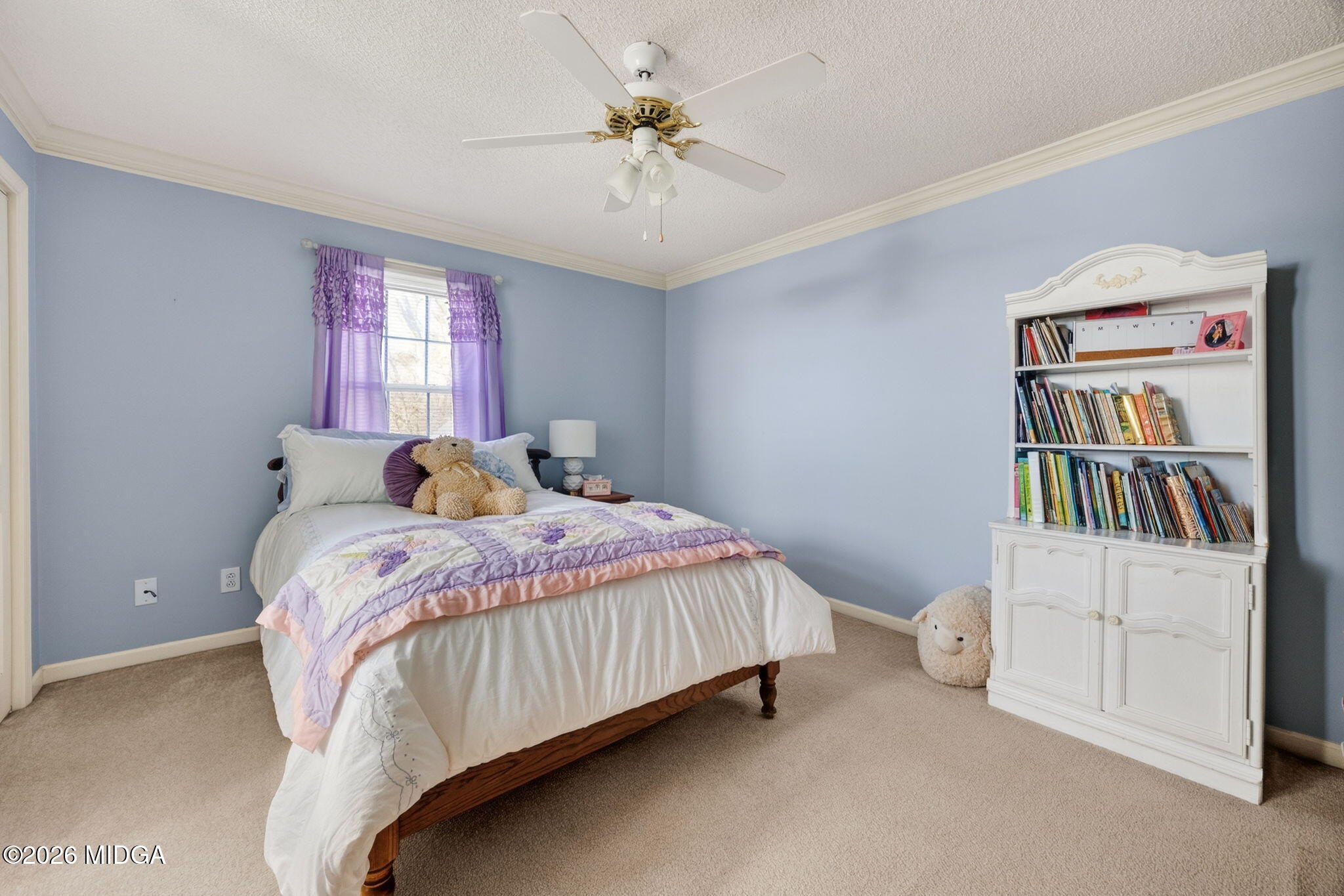 312 Pinnacle Park Macon, GA 31220 - Photo 35 of 63 a bedroom with a bed table and a book shelf