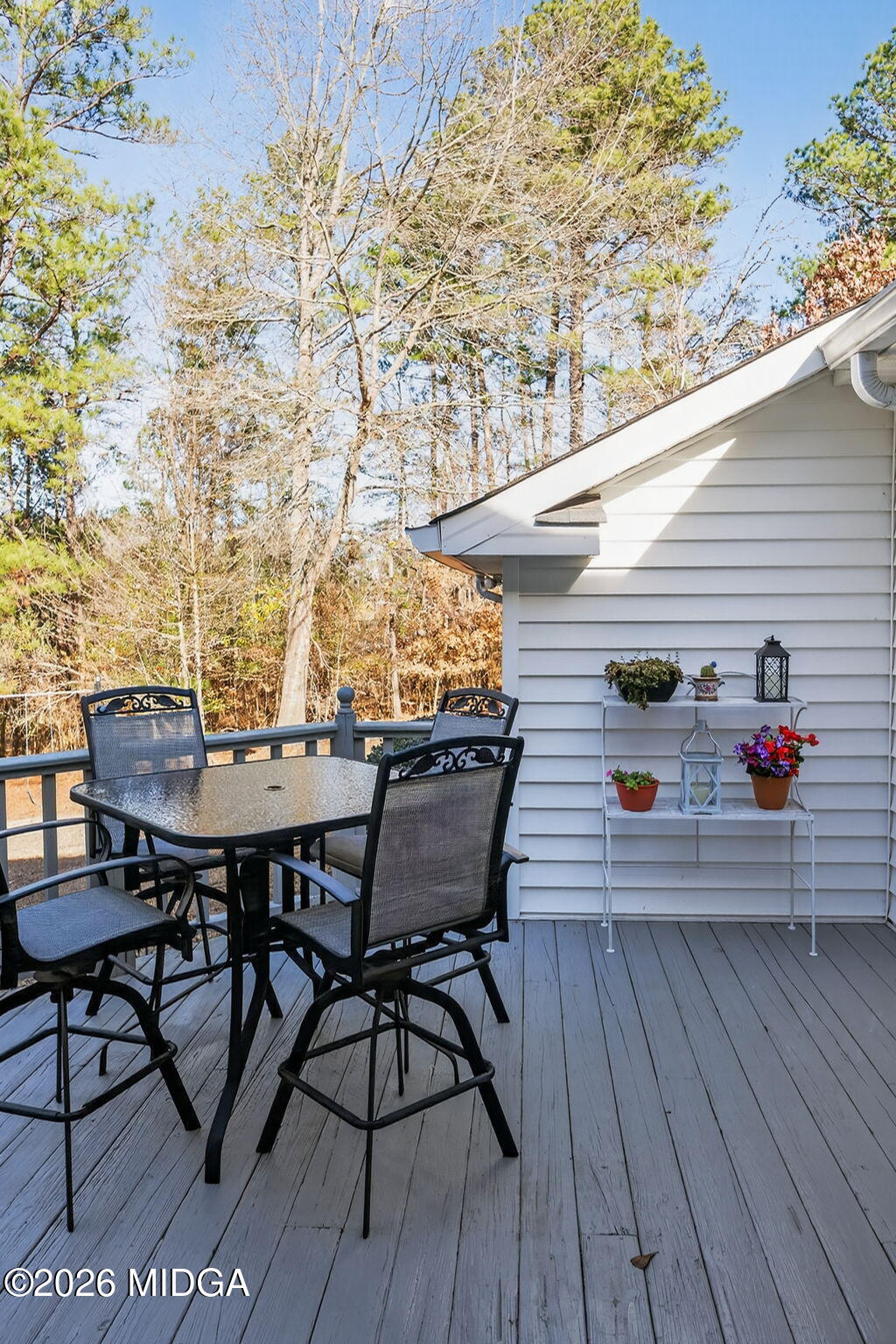312 Pinnacle Park Macon, GA 31220 - Photo 49 of 63 a view of a chairs and table on the wooden deck
