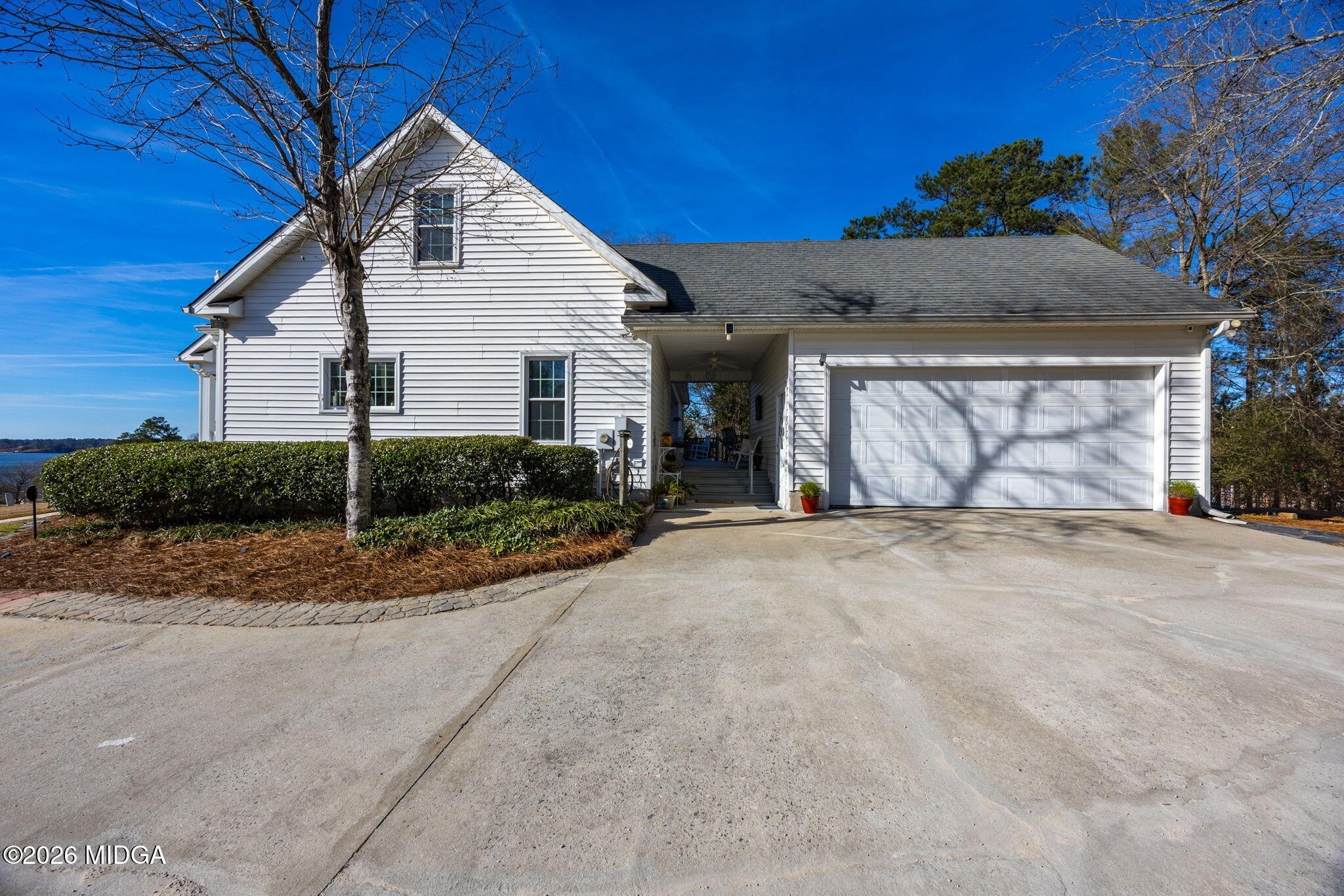 312 Pinnacle Park Macon, GA 31220 - Photo 53 of 63 a view of a white house with a yard