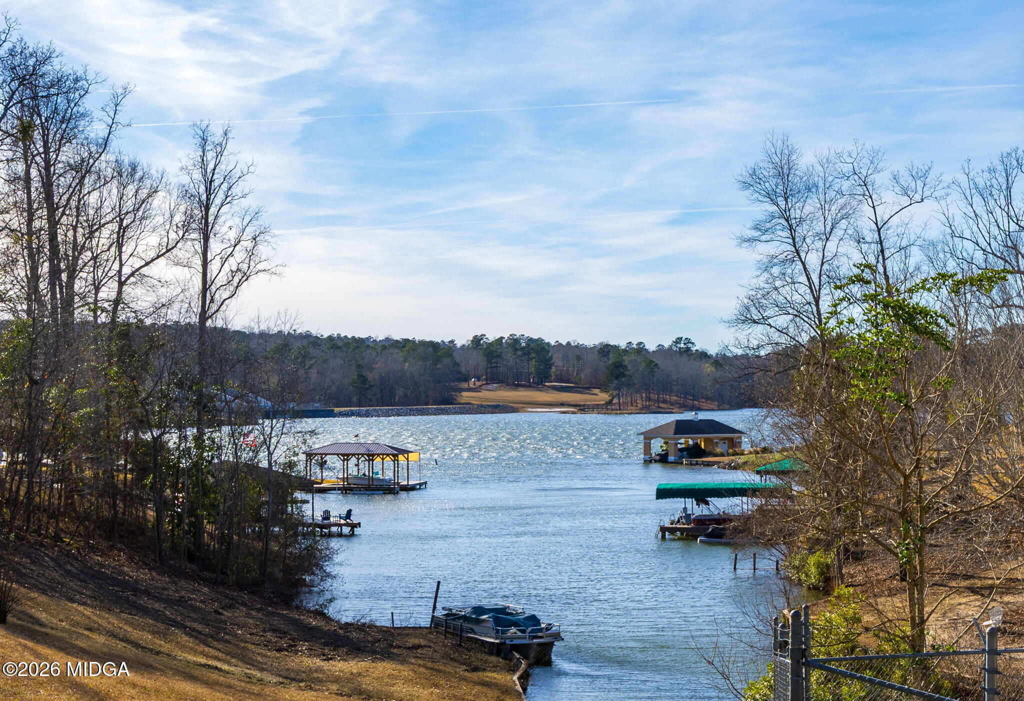 312 Pinnacle Park Macon, GA 31220 - Photo 62 of 63 a view of a lake in between two chairs