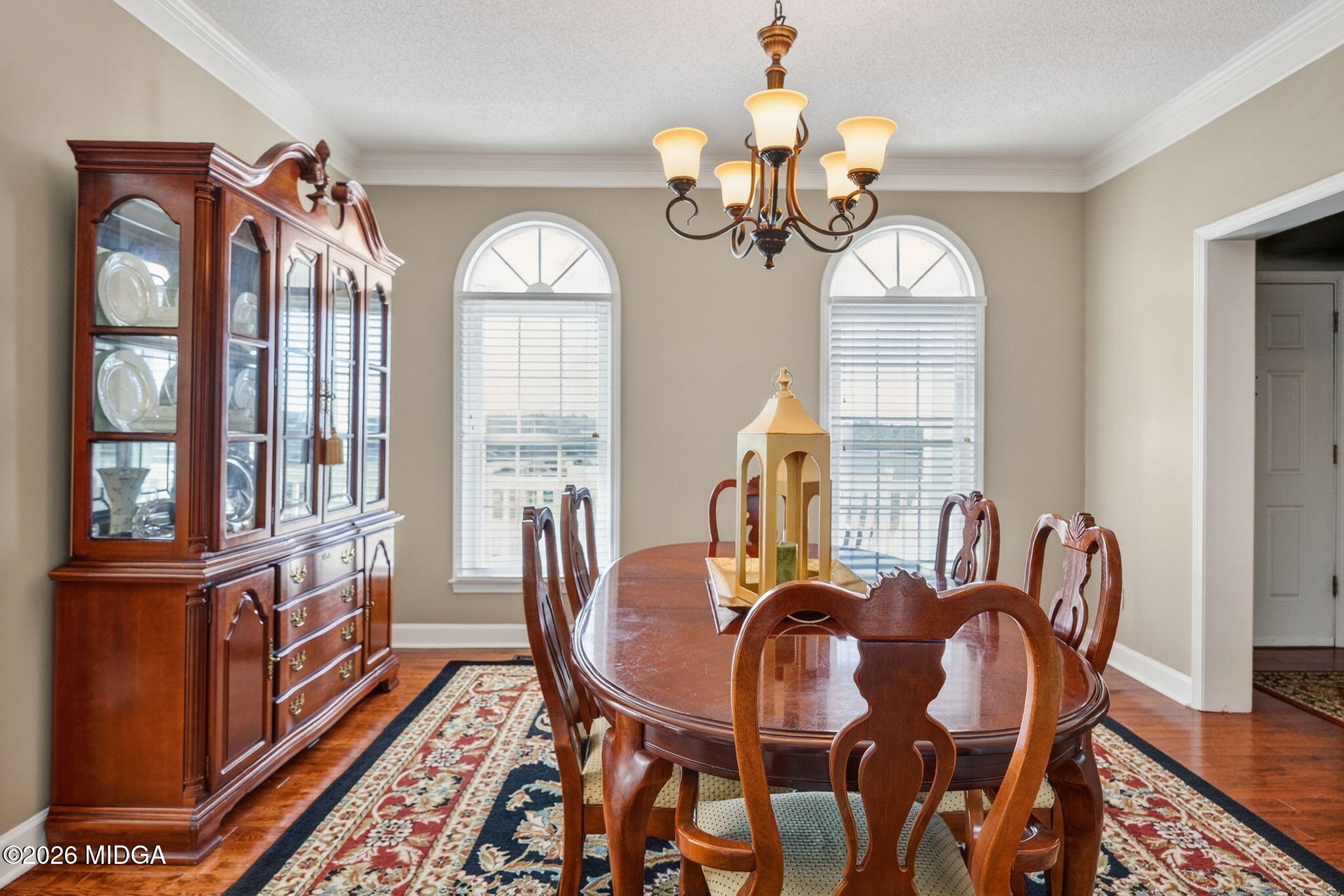 312 Pinnacle Park Macon, GA 31220 - Photo 8 of 63 a view of a dining room with furniture wooden floor and chandelier