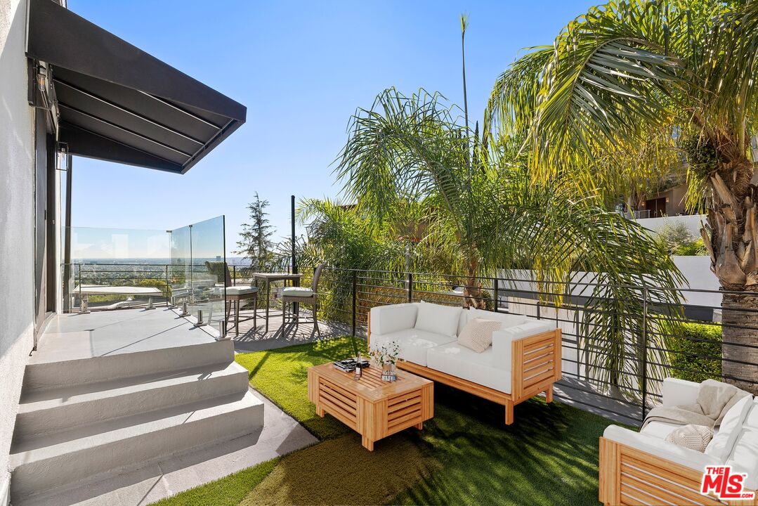 1788 North Orange Grove Avenue Los Angeles, CA 90046 - Photo 20 of 20 a view of a patio with couches and pool