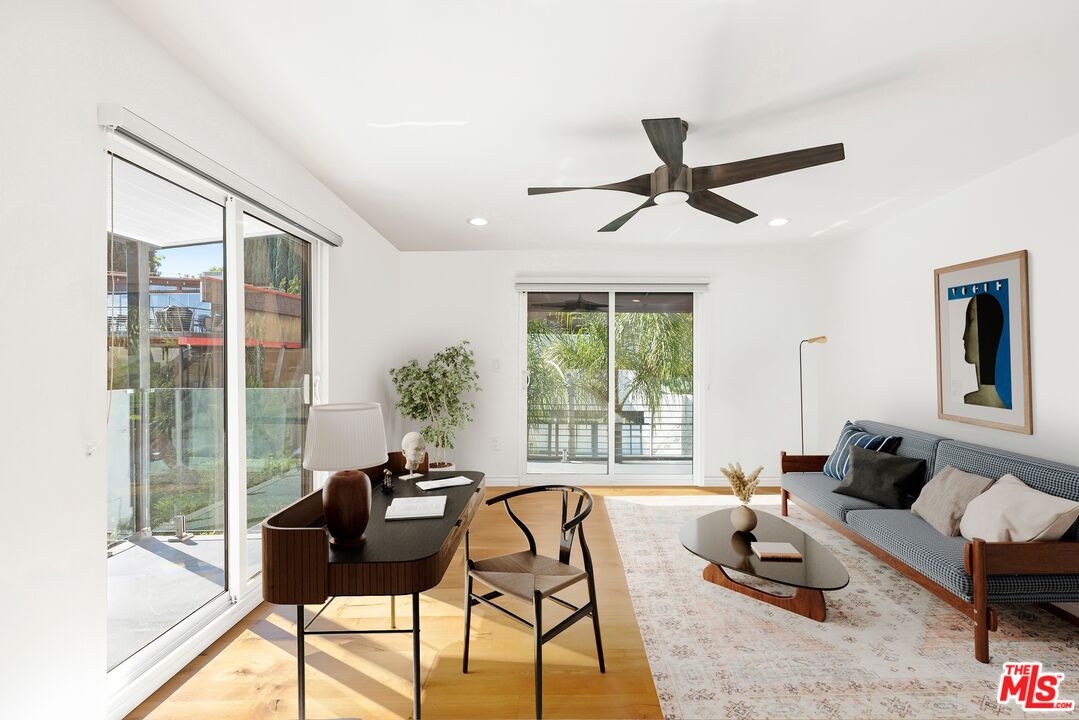 1788 North Orange Grove Avenue Los Angeles, CA 90046 - Photo 9 of 20 a living room with furniture and a window