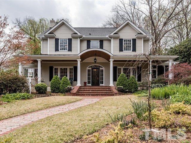 807 Harvey Street Raleigh, NC 27608 - Photo 1 of 24 a front view of a house with a yard
