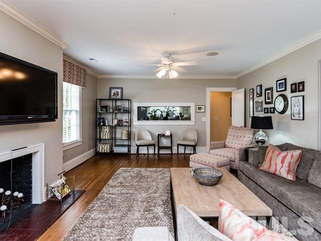 807 Harvey Street Raleigh, NC 27608 - Photo 14 of 24 a living room with furniture and a flat screen tv