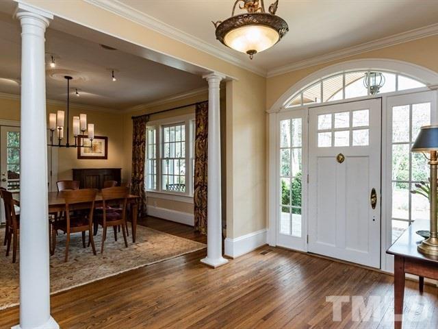 807 Harvey Street Raleigh, NC 27608 - Photo 3 of 24 a view of dining room with furniture window and wooden floor