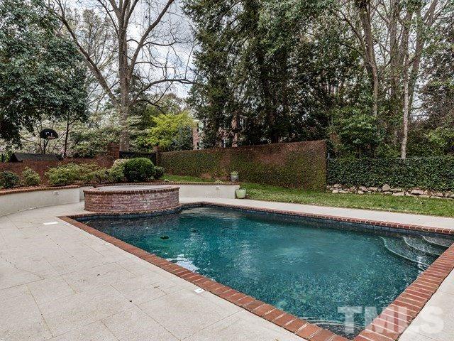 807 Harvey Street Raleigh, NC 27608 - Photo 21 of 24 a view of a yard with large trees