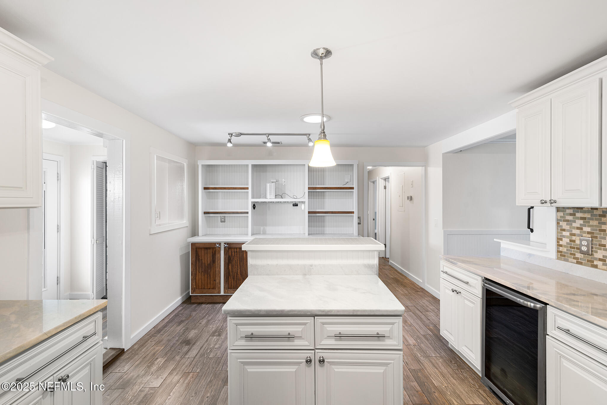 370 10th Street Atlantic Beach, FL 32233 - Photo 10 of 24 a view of a kitchen with wooden floor and electronic appliances
