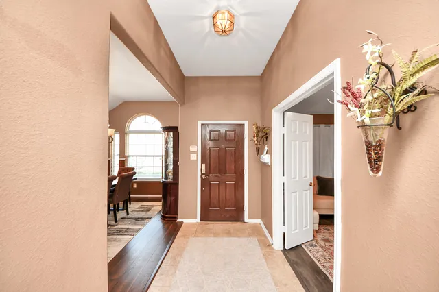 a view of livingroom with furniture and windows