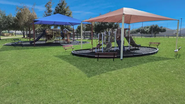 a view of a table and chairs under an umbrella