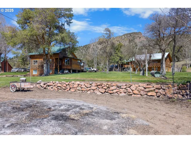 a view of street with parked cars