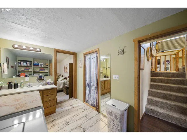 a view of a living room and bathroom