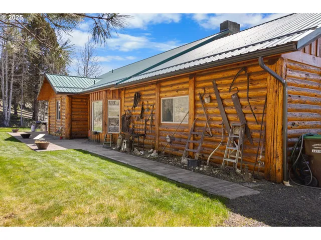 a view of swimming pool with outdoor seating