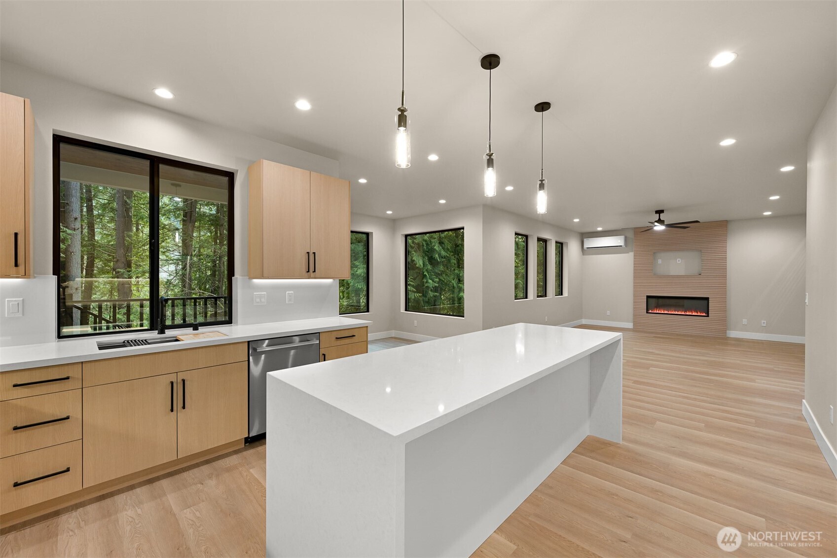 353 Sudden Valley Drive Bellingham, WA 98229 - Photo 13 of 40 a large kitchen with kitchen island a sink stainless steel appliances and a large window