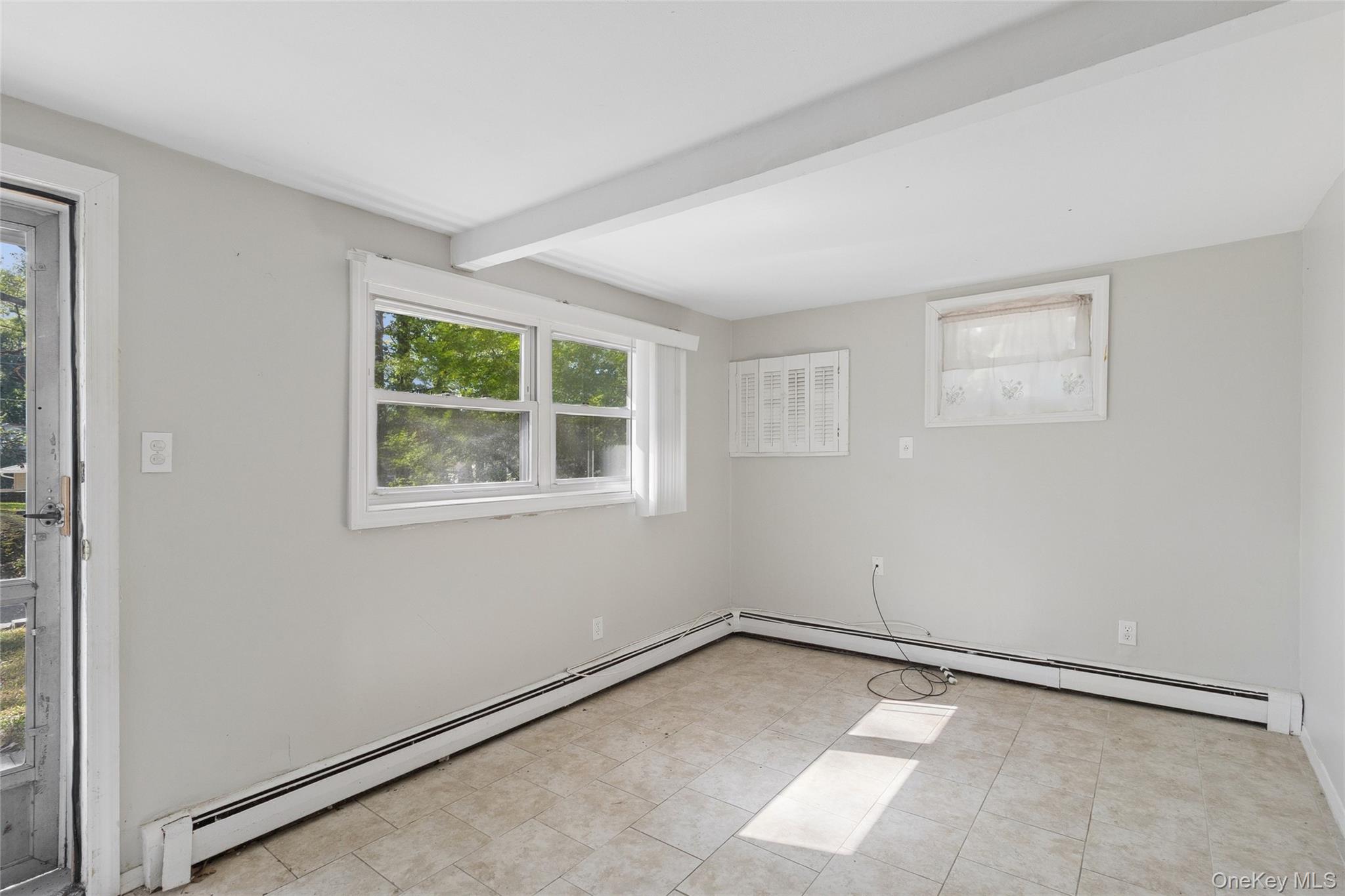 7 Yucca Road Rocky Point, NY 11778 - Photo 14 of 22 a view of a room with a large window