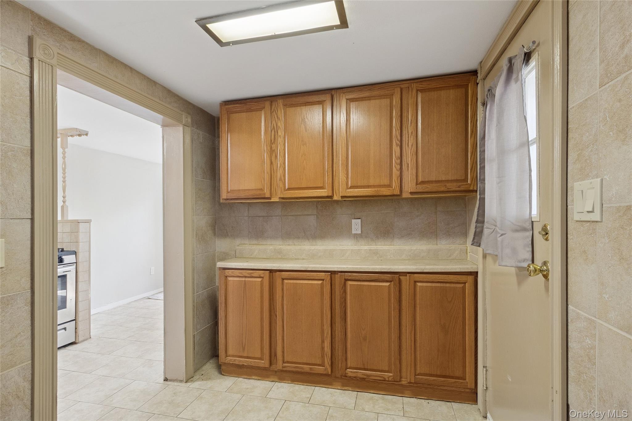 7 Yucca Road Rocky Point, NY 11778 - Photo 18 of 22 a view of a kitchen with granite countertop cabinets