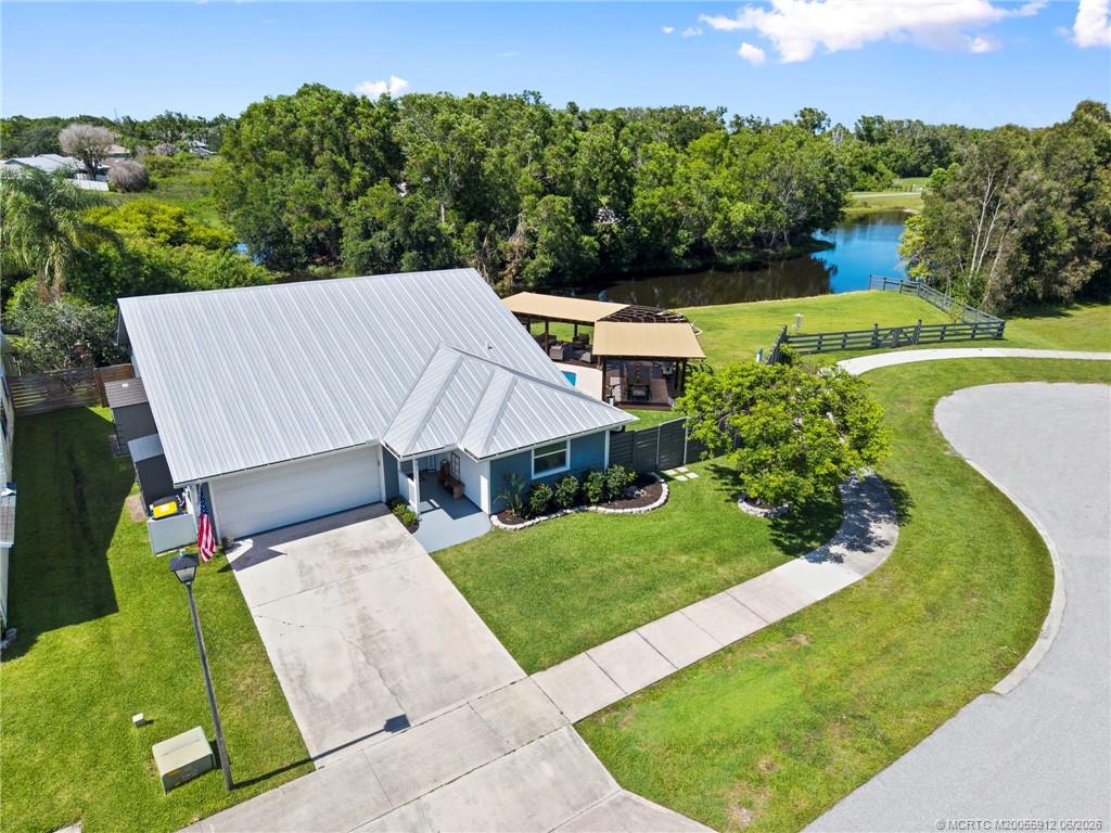 4401 Southeast Satinleaf Place Stuart, FL 34997 - Photo 1 of 51 Beautiful Corner Lot with Lake View
